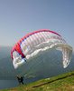 Paragliders are taking off on slopes of Vogar above Bohinj, Slovenia. Planina Vogar (Meadows of Vogar) is among most popular paragliders places and is laying about 500 meters above Bohinj and Bohinj lake.
