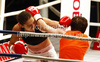 Tjasa Kolar of Slovenia and Anika Kurzer of Germany during boxing match. Boxing match between Kolar and Kurzer was held on 4th of September 2010 in Stozice Arena in Ljubljana, Slovenia.
