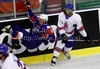 Greg Kuznik (no.18) of Slovenia (L) and Matt Myers (no.8) of Great Britain (R) during ice hockey match of IIHF Ice hockey World championships Division I, group B between Great Britain and Slovenia. Match between Great Britain and Slovenia of IIHF Ice hockey World championships Division I, group B was held on Tuesday, 20th of April 2010 in Ljubljana, Slovenia.
