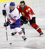 Ben OConnor (no.27) of Great Britain (L) and Martons Vas (no.10) of Hungary (R) during ice hockey match of IIHF Ice hockey World championships Division I, group B between Great Britain and Hungary. Match between Great Britain and Hungary of IIHF Ice hockey World championships Division I, group B was held on Wednesday, 21st of April 2010 in Ljubljana, Slovenia.
