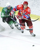Susanj Gaspr (no.23) of HK Jesenice (R) and John Hughes (no.44) of HDD Olimpija (L) during ice hockey match Summer League Rudi Hiti (Poletna liga Rudi Hiti) 2010 between HDD Tilia Olimpija and HK Acroni Jesenice. Match between HDD Tilia Olimpija and HK Acroni Jesenice was held on Friday, 20th of August 2010 in Ljubljana, Slovenia.
