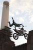 A competitor in action during a training session for the Red Bull X-Fighters Moto X event held at Battersea Power Station in London, England, on 12th of August 2010.
