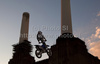Mike Mason (USA) in action during a training session for the Red Bull X-Fighters Moto X event held at Battersea Power Station in London, England, on 12th of August 2010.
