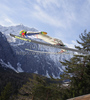 Johan Remen Evensen of Norway soars through the air during trial round of day 3 of FIS ski jumping World Cup 2010-2011 finals in Planica, Slovenia. Last individual competition of season on day 3 of FIS ski jumping World cup finals was held on Sunday, 20th of March 2011, in Planica, Slovenia.
