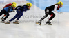 Marianne St Gelais of Canada and Seung Hi Park of Korea during World short track speed skating team World championships, which was held on 20th of March 2011 in Warszawa, Poland.
